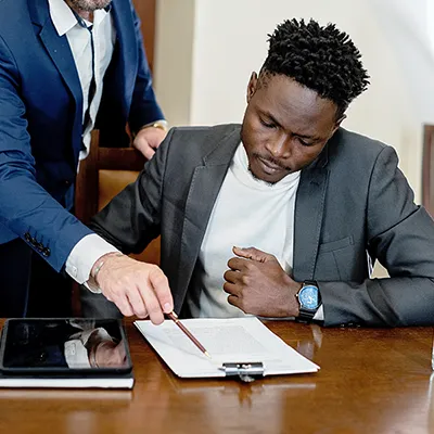 Legal Video Man signing a legal document