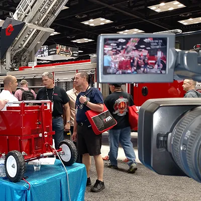 Live Event Video Convention floor with people and a camera recording video