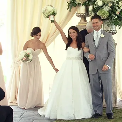 Wedding Video Production Bride and groom smiling after being introduced