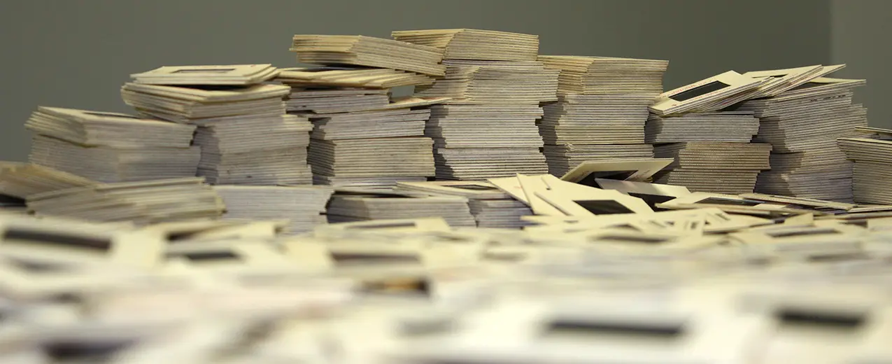 Thousands of slides stacked and scattered